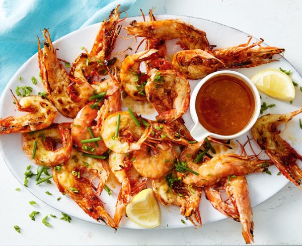 Mixture of grilled salted prawns and passion fruit oil